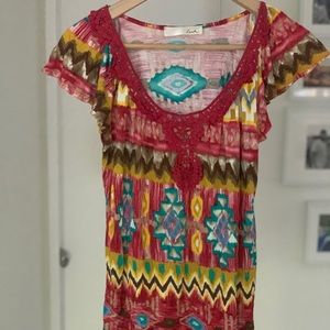 Colorful shirt with a floral print.